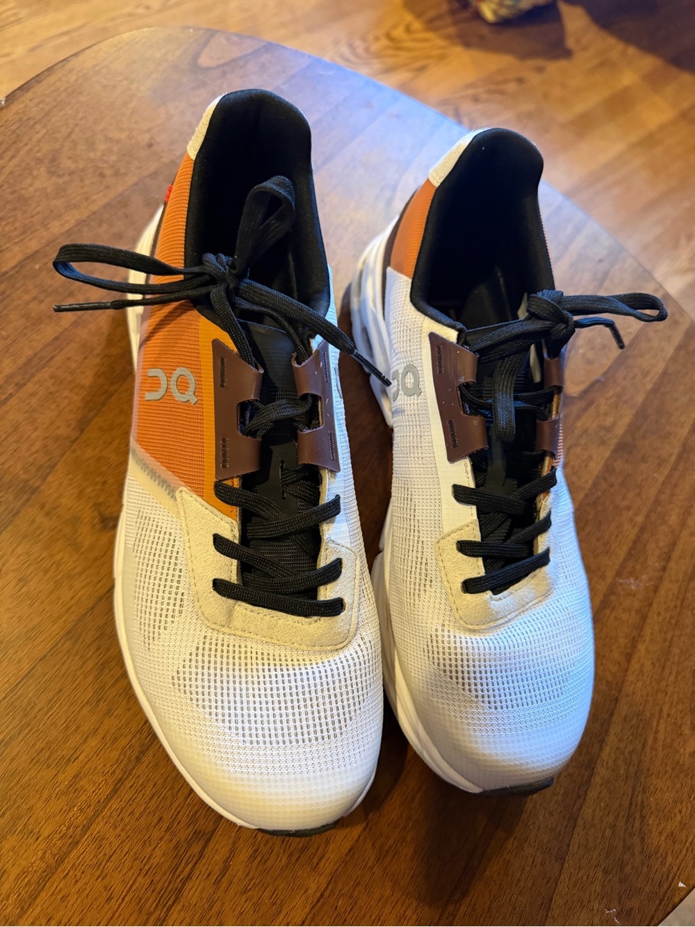 On Running Women's Sneakers — White, Orange & Black